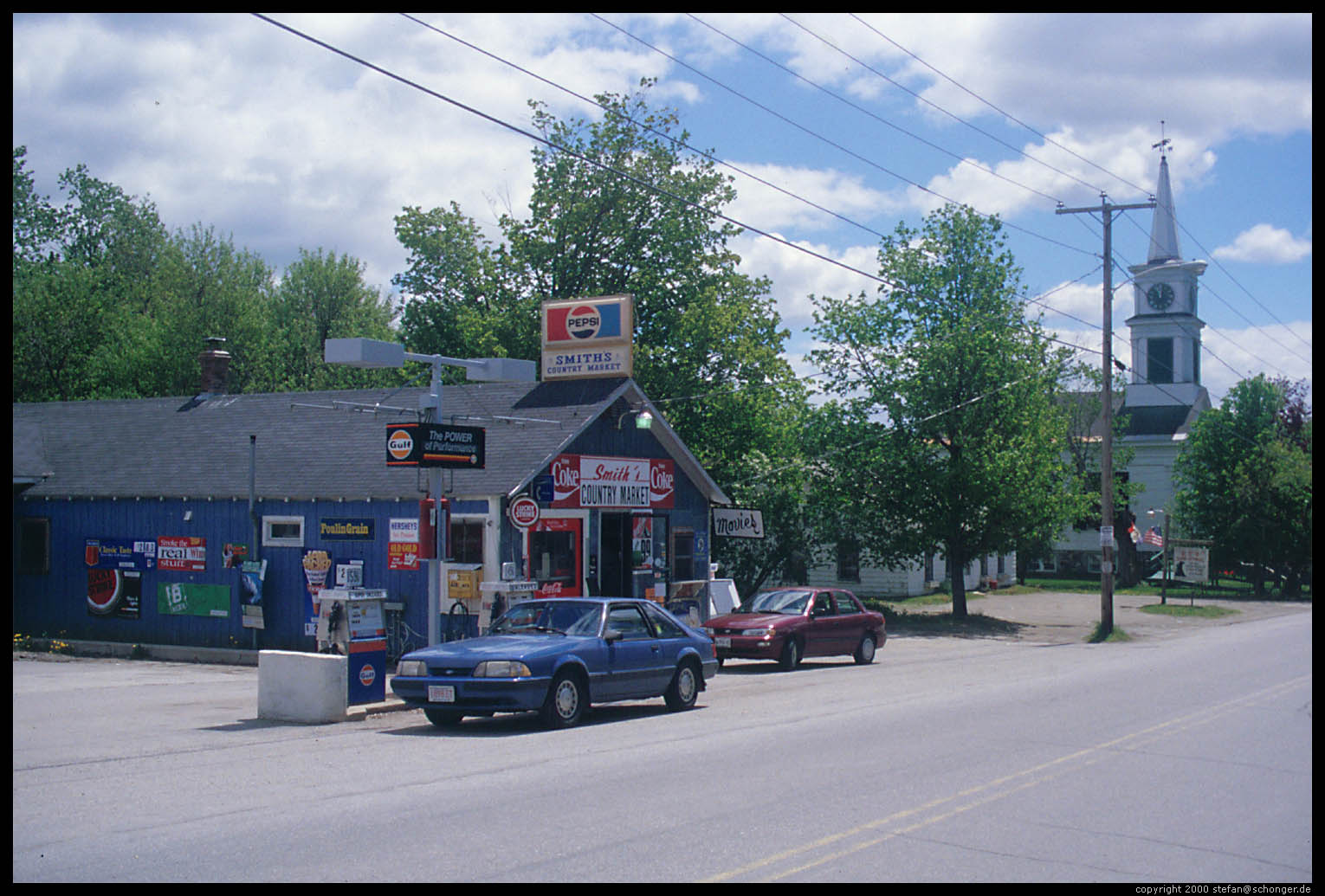 Mustang at gas station, Maine, May 2000
